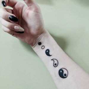 Tatuagem feminina: yin yang